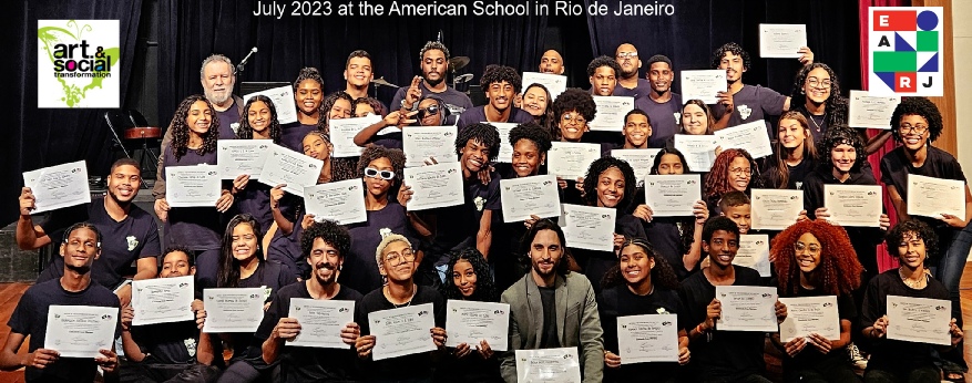 Group of students holding certificates at the American School in Rio de Janeiro.